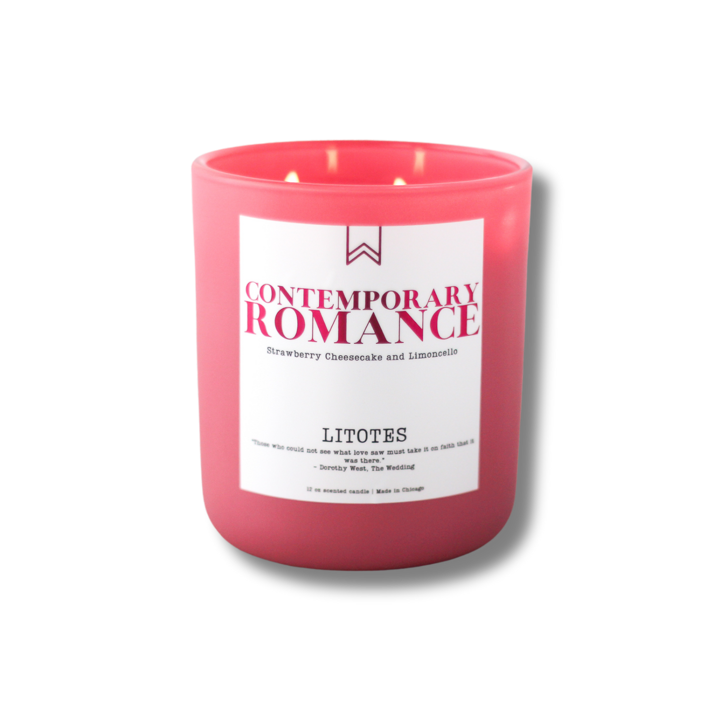 A blush pink candle with a label that reads 'Contemporary Romance', with the brand name 'LITOTES' and the scent name 'Limoncello and Strawberry Cheesecake'. The candle has two wicks.